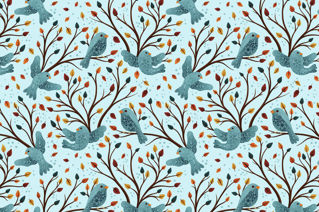 A pattern of blue birds with decorative floral elements flying amid fall tree branches